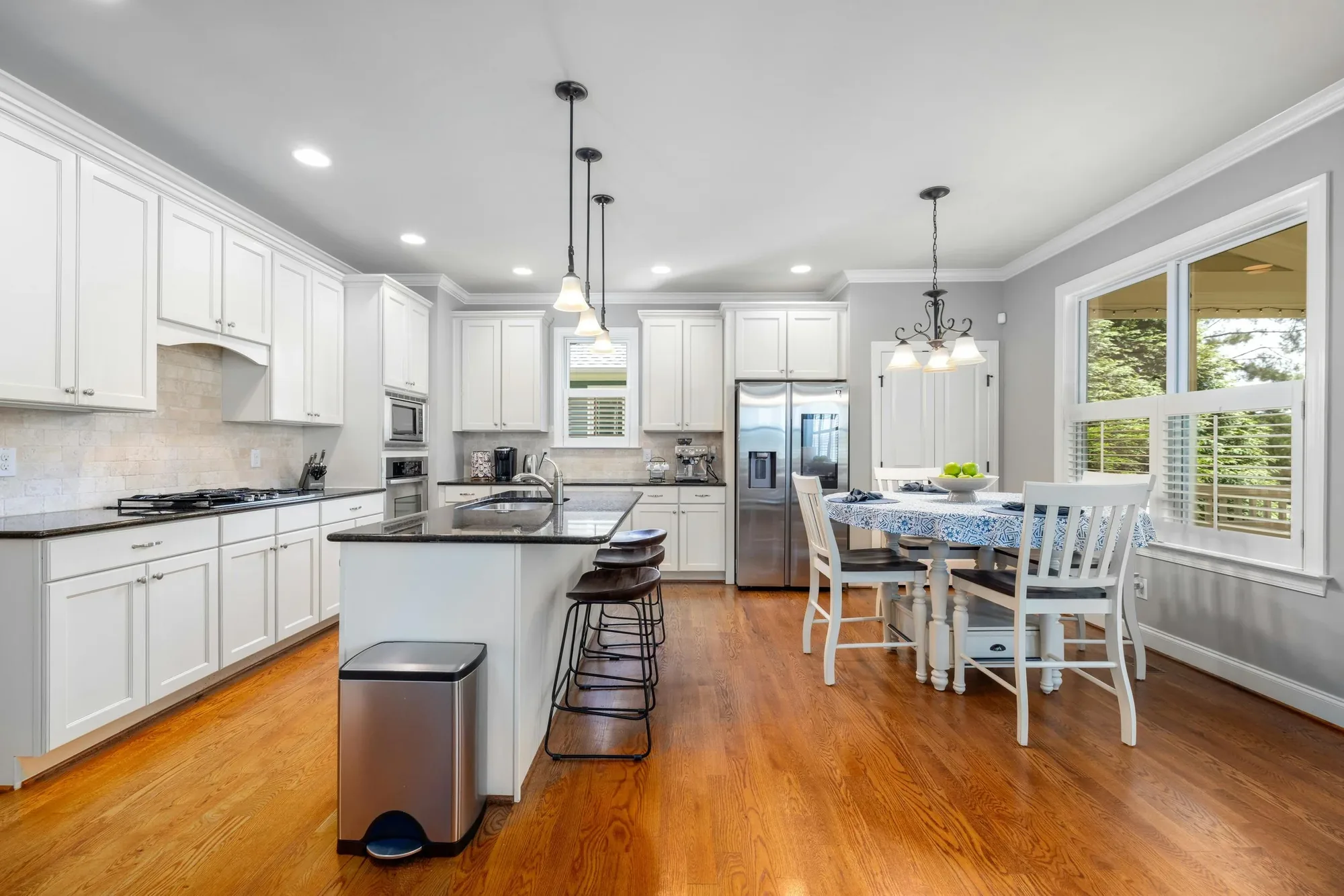 Professional HDR interior real estate photograph of a bright Colorado Springs living room